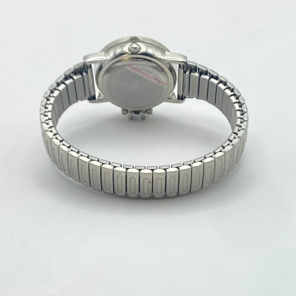 Accutime Hidden Dial Women's Watch Monkey Silver Tone Stretch Band New Battery